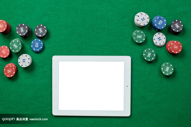 Online poker game with digital tablet and stack Online poker game with digital tablet and stack